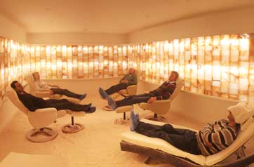 People relaxing in a salt cave